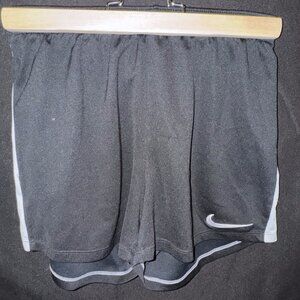 Black Nike Athletic Shorts With White Strip Down The Side
